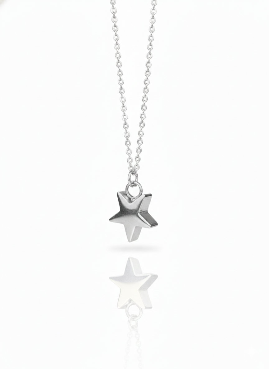 Silver star-shaped pendant on a chain against a white background